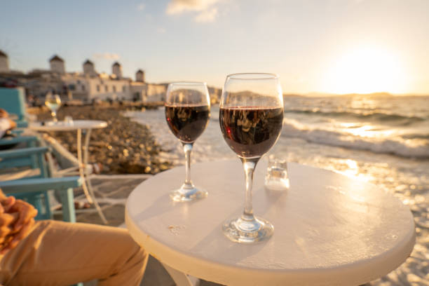 Two glasses of red wine ready for tasting stock photo