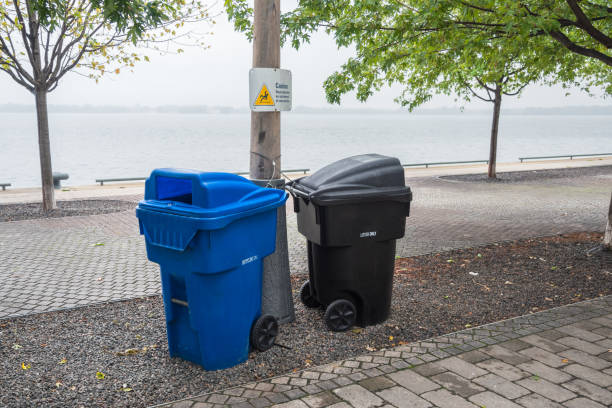 Waste bin in the sand on the beach. With copy space. Shot with a 35-mm full-frame 61MP Sony A7R IV.