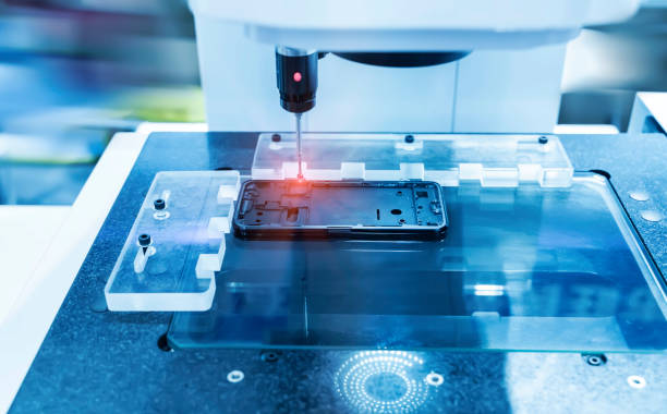 istock The multi-axis CMM machine measure the aluminum mobile phone part . 1361550701