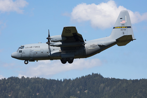 Zeltweg / Austria - September 4, 2019: United States Air Force USAF Lockheed Martin C-130H Hercules 95-6709 transport plane with support landing at Zeltweg Air Base