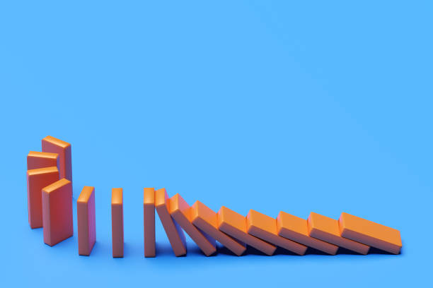 istock Domino.The blocks are pushing with blank background. Trends and problems concept 1361564213