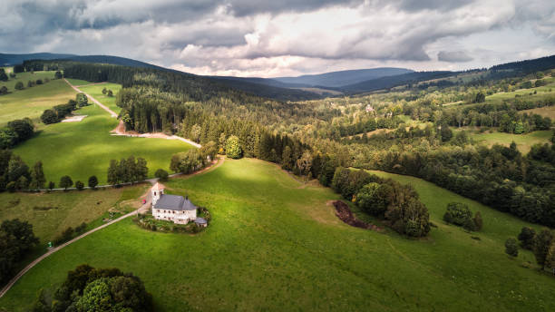 Church of St. John of Nepomuk, Orlické Mountains, Czech Republic Aerial drone photography of Kostel sv. Jana Nepomuckého, Orlické Mountains, Czech Republic czech republic mountains stock pictures, royalty-free photos & images