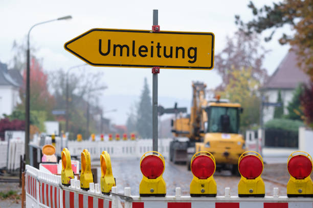 Umleitung ( detour ) traffic sign at a closed road due to a  construction site stock photo