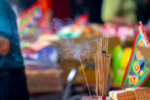 Chinese traditions, religious customs, Zhongyuan Purdue, Chinese Ghost Festival, believers, burning incense and praying for blessings stock photo