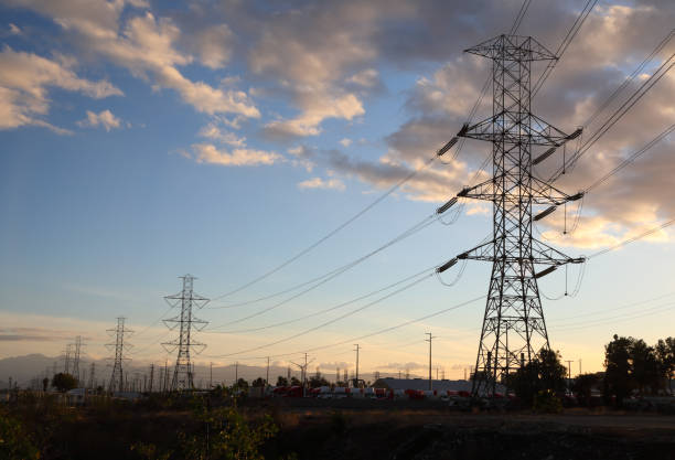 High Voltage Power Lines in Ontario California Horizontal High voltage transmission power lines shot in Ontario California. smart grid stock pictures, royalty-free photos & images