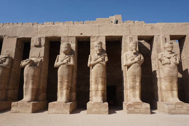 istock Impressive row of statues at Karnak Temple, Luxor, Egypt 1361579498
