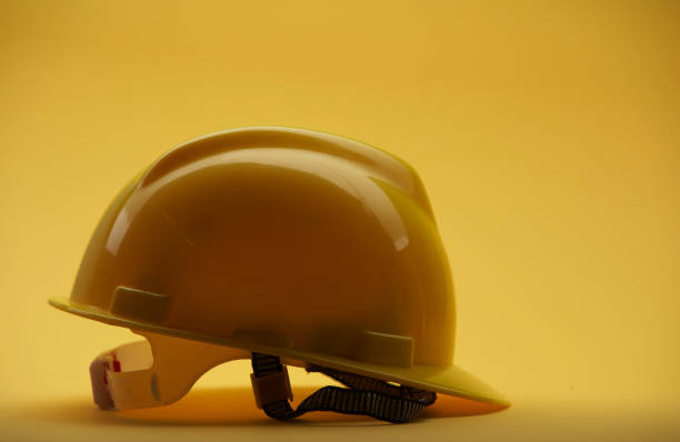 istock yelloew construction helmet on yellow background 1361579868