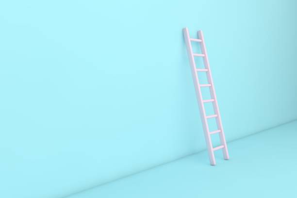istock Pink step ladder near the wall 1361582553