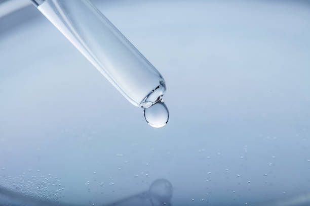 istock Petri dish and pipette with transparent liquid drop 1361587763