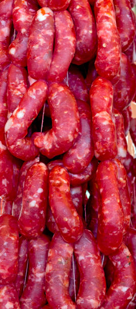 istock Fresh sausage exposed on market stall 1361590216