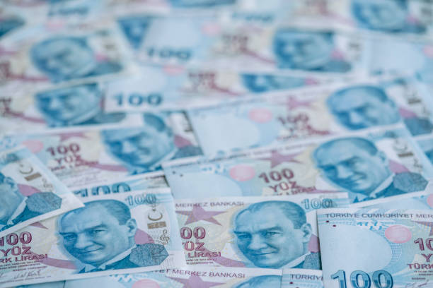 istock Background with hundred Turkish Lira banknotes that Turkey currency 1361590228