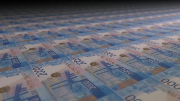 istock 2000 Russian Rubbles bills on money printing machine. 1361590282