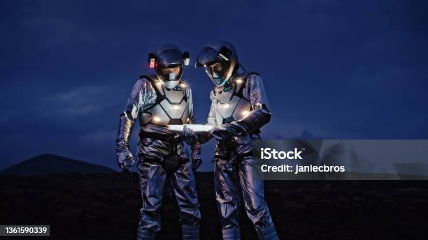 Selfie Out Of This World Astronauts In Futuristic Suits Taking Photo And Setting The Light Stock Photo - Download Image Now