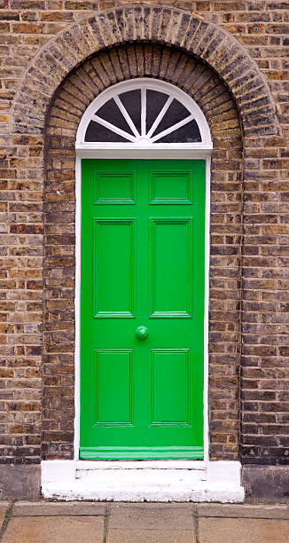 Green front door stock photo