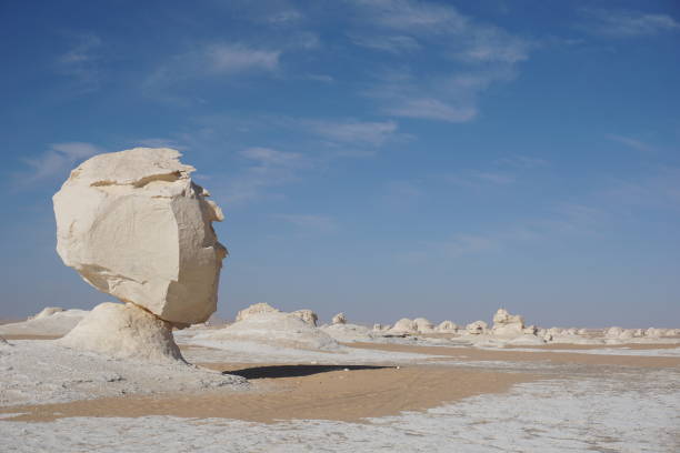 istock Head shaped rock formation in the white desert 1361592112