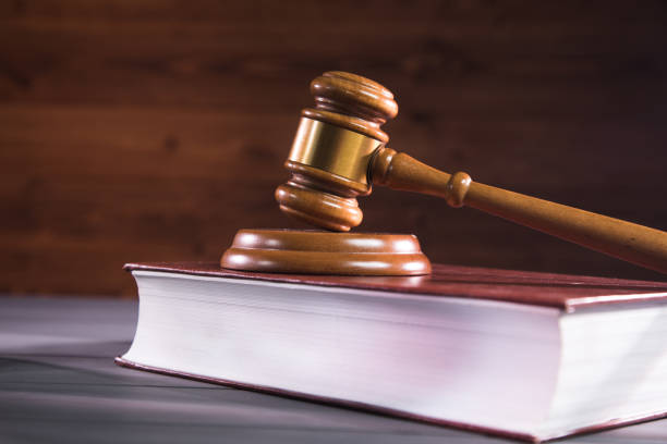 istock the judge's hammer on the book 1361592114