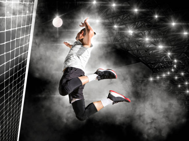 Volleyball player players in action. Sports banner Volleyball player players in action. Sports banner. Concept with copy space male volleyball player stock pictures, royalty-free photos & images