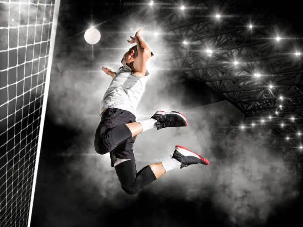 Photo of Volleyball player players in action. Sports banner