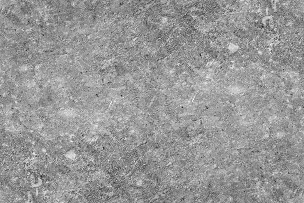 Rough gray blank concrete wall with grunge texture for background