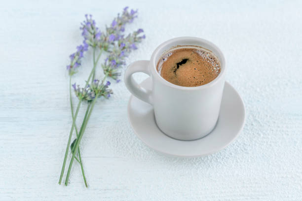 istock cup of turkish coffee on table decorated with lavender flowers 1361593314