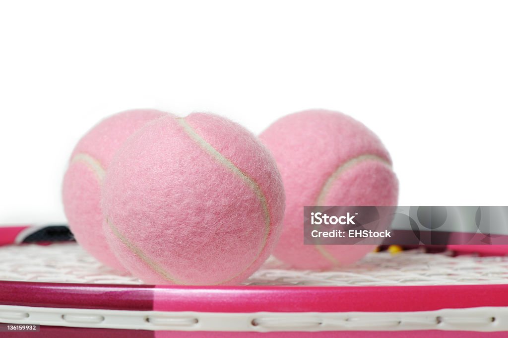 Tennis Balls on Racket Pink Color Stock Photo