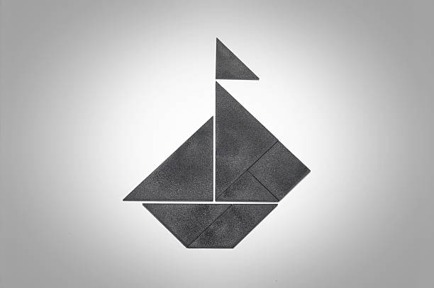 istock Tangram sailboat with flag 136159947