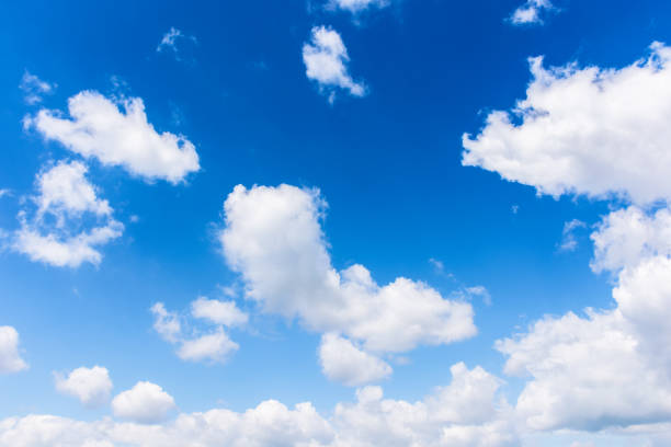 istock white fluffy clouds on the azure sky 1361601361