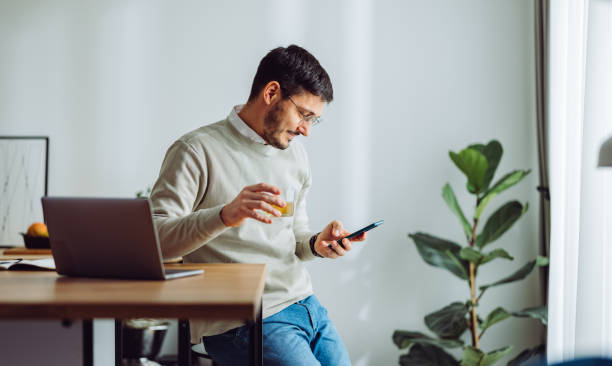 istock Happy Businessman Working at Home 1361604372