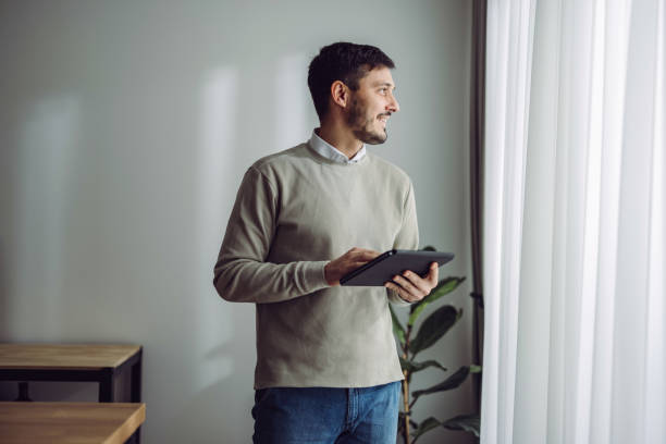 istock Happy Businessman Working at Home 1361604448