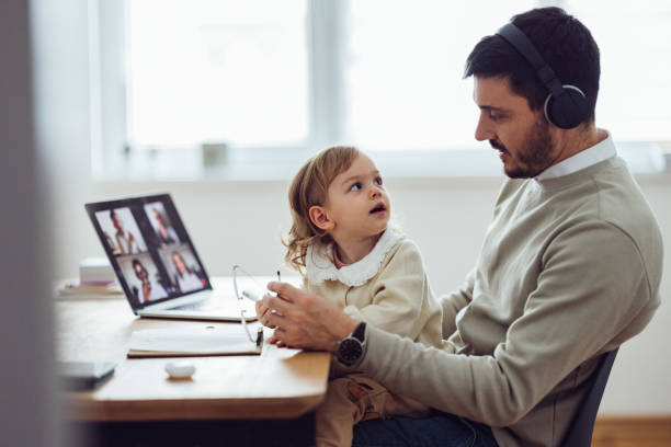 istock Happy Father Talking on Video Call Meeting at Home 1361604482