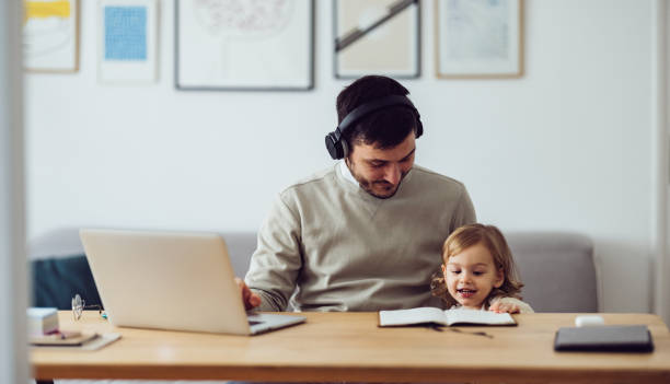 istock Happy Single Father Working at Home 1361604485