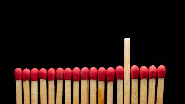 istock matches in a row on a black background. 1361605486