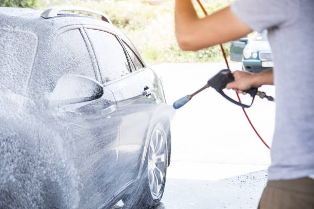 istock A man with a high pressure hose applies foam 1361606015