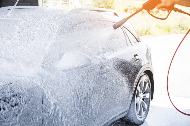 istock A man with a high pressure hose applies foam 1361606020