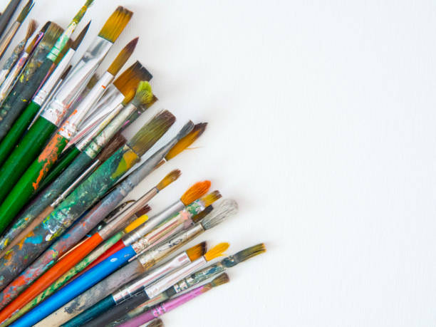 istock many different brushes for painting, artist's working brushes close-up, copy space 1361607961