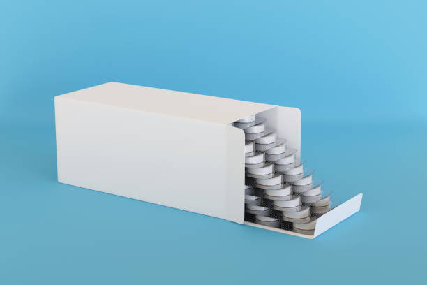 istock Blank box with pills blisters on blue background. 3d illustration. 1361610267