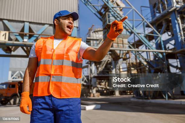 Experienced Worker On His Job At Construction Plant Stock Photo - Download Image Now