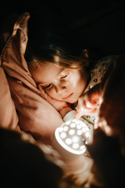 istock Little preschool girl sleeping in comfortable bed 1361613205