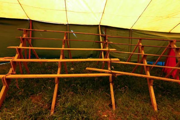 Photo of Audience of traveling circus with empty chairs