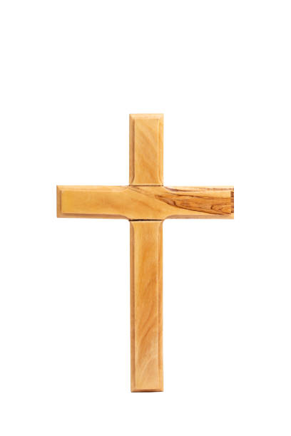 istock Wooden crucifix standing on white background. 1361618623