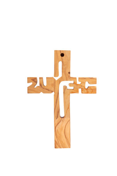 istock Wooden crucifix standing  back side on white background. 1361618624
