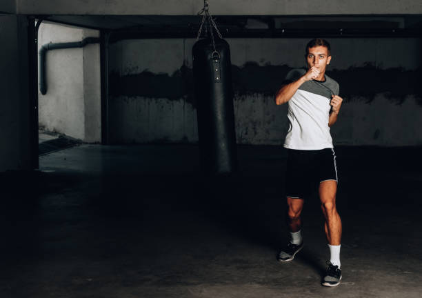 istock Boxing concept with young sportsman 1361629058