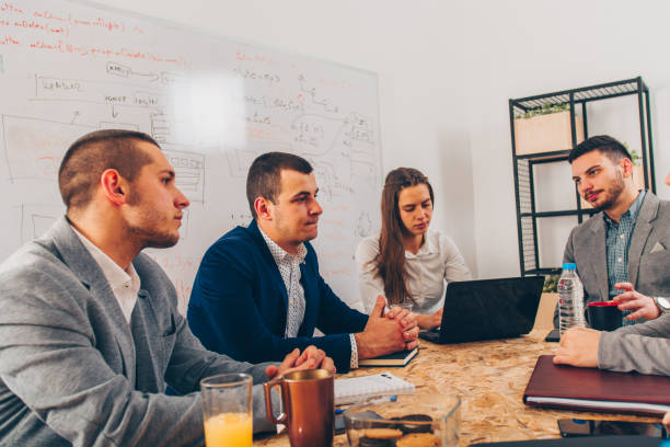 istock Modern businessmans in the room 1361634640