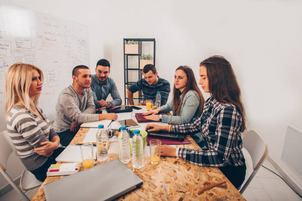 istock Colleagues discussing in the office 1361638296