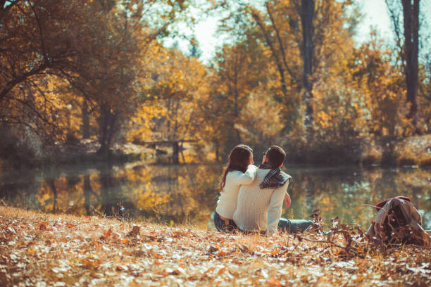 istock Amorous couple spending time in the park 1361641135
