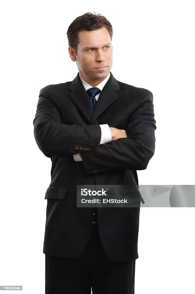 Frustré Homme d'affaires debout avec les bras croisés isolé sur fond blanc - Photo de Bras croisés libre de droits