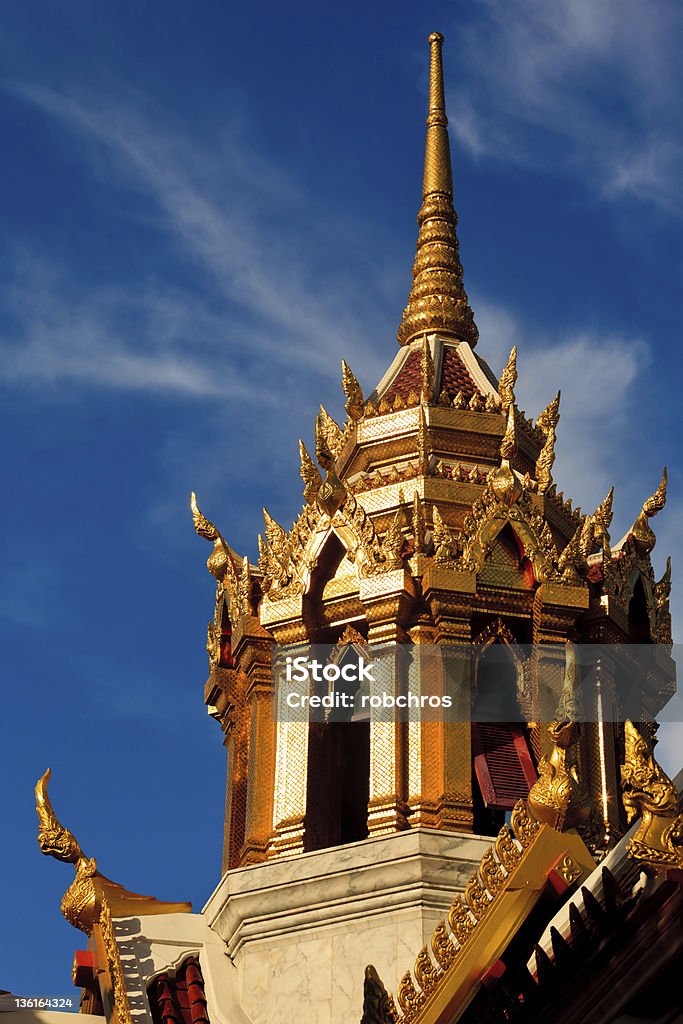 Temples Evening Light Evenings light graces itself upon the Tritotsathep Temple, Bangkok Thailand. Bangkok Stock Photo