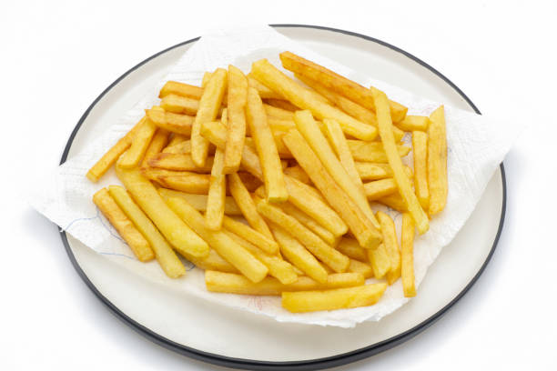istock French fries on white background. 1361654618
