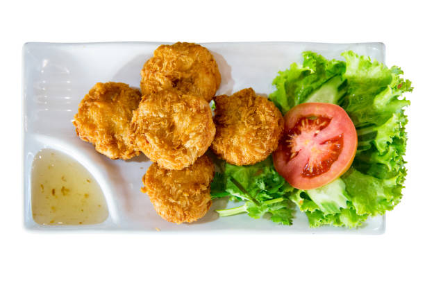 istock Die cut of Crispy Fish Cake on white isolated. 1361659534