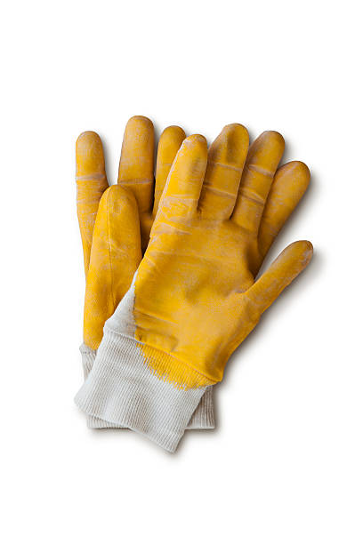 Yellow work gloves with clipping path stock photo